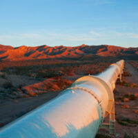 Beautiful,Sunrise,Lighting,On,A,Pipeline,In,The,Mojave,Desert.